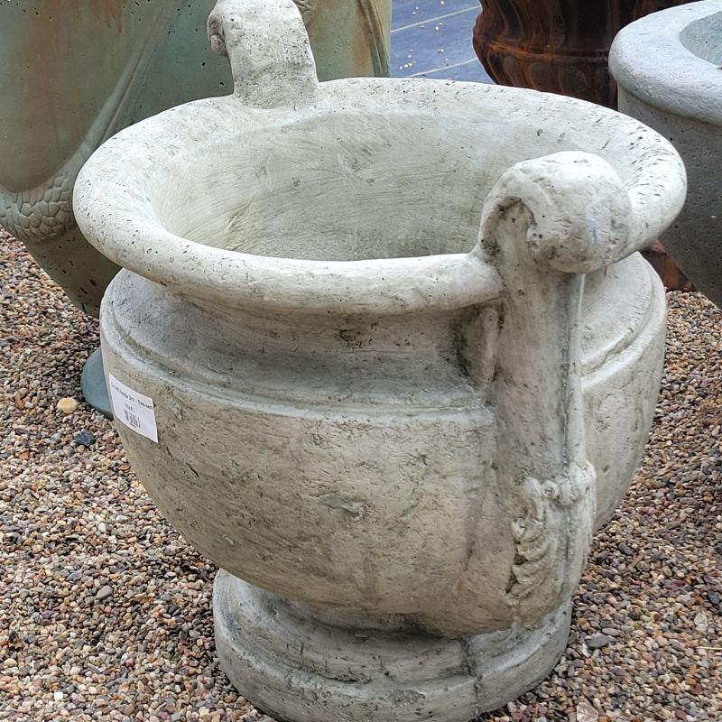 A close-up photo of the Curved Handle Urn planter from a 3/4 perspective illustrating handle design