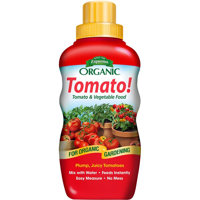 A stock image of Espoma Organic Tomato! Tomato & vegetable food in a red bottle with yellow cap