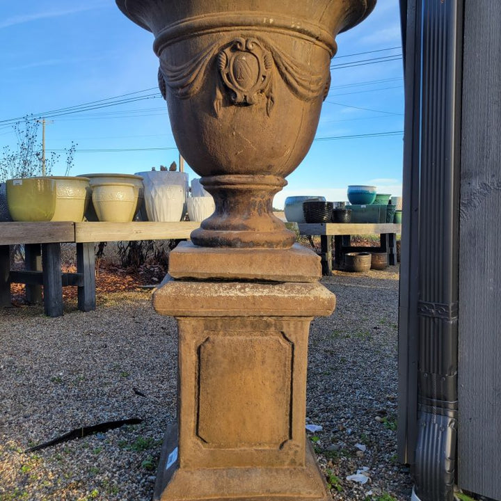 The Large Square Frame Pedestal on display with the Tivoli Urn atop it.