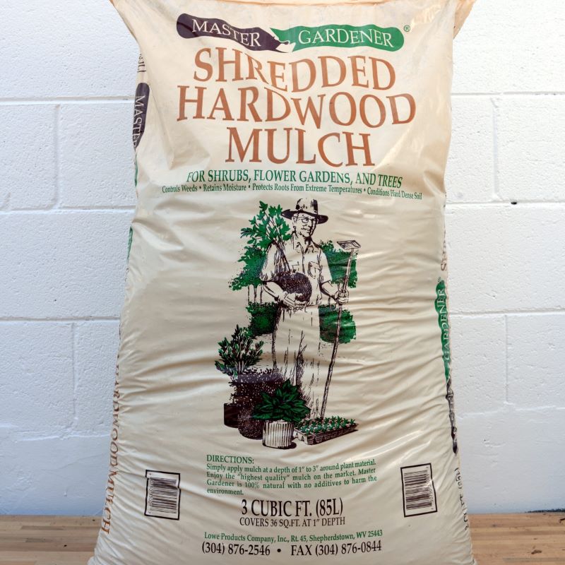 Master Gardener brand Shredded Hardwood Mulch in a 3 cubic foot bag.