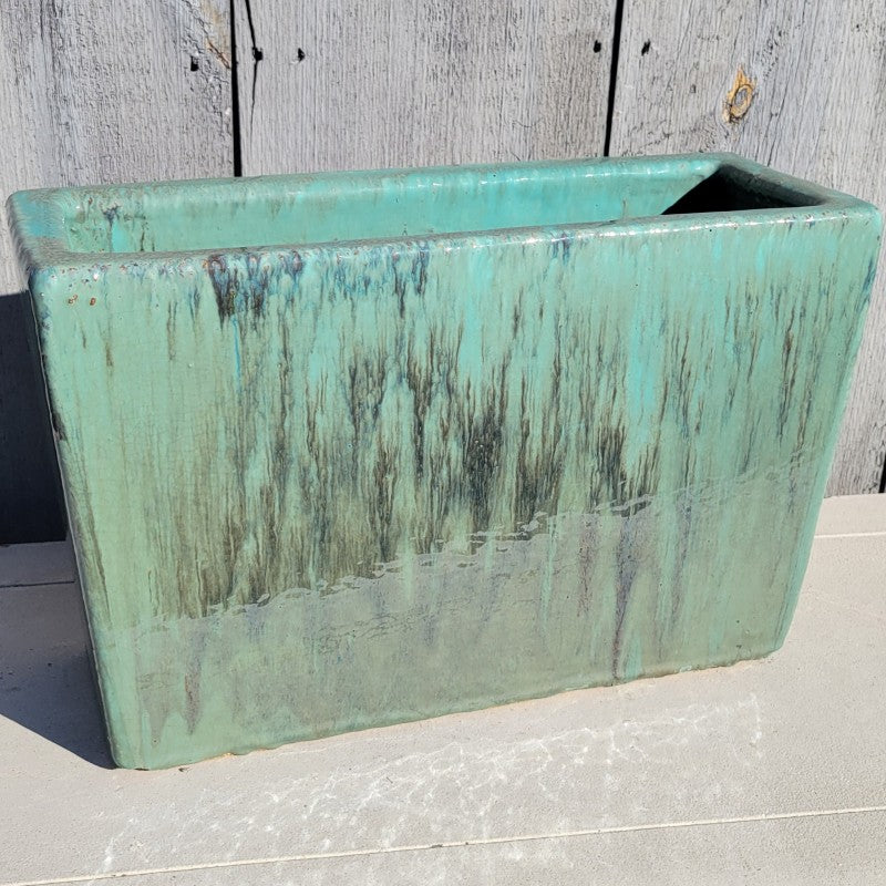 A tall, rectangular planter with sea-foam green to dark jade green glaze.