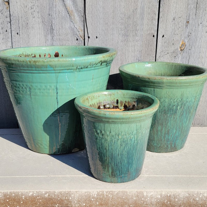 A trio of blue-green 'Glacier' glaze finished Rolled Rim Planters, in extra small, small, and medium.