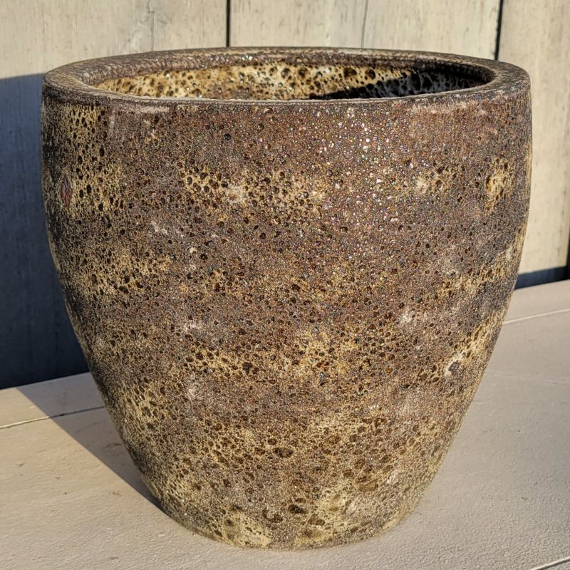 A rounded Symi planter with bowed walls; finished with a gray-green rough-textured pumice-stone glaze.