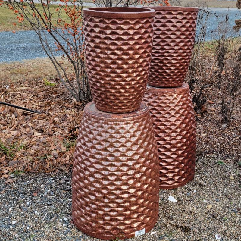 A group of Tall Honeycomb Planters with two pair of the planters (Medium and Extra Large) stacked atop each other.