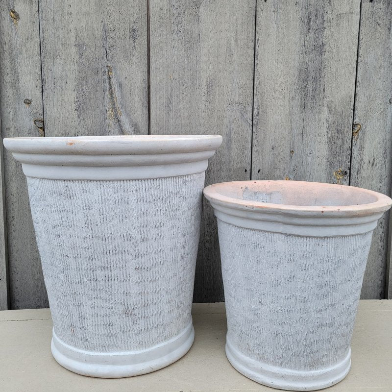 A pair of upright Tall Shiloh Planters, one medium and one large.